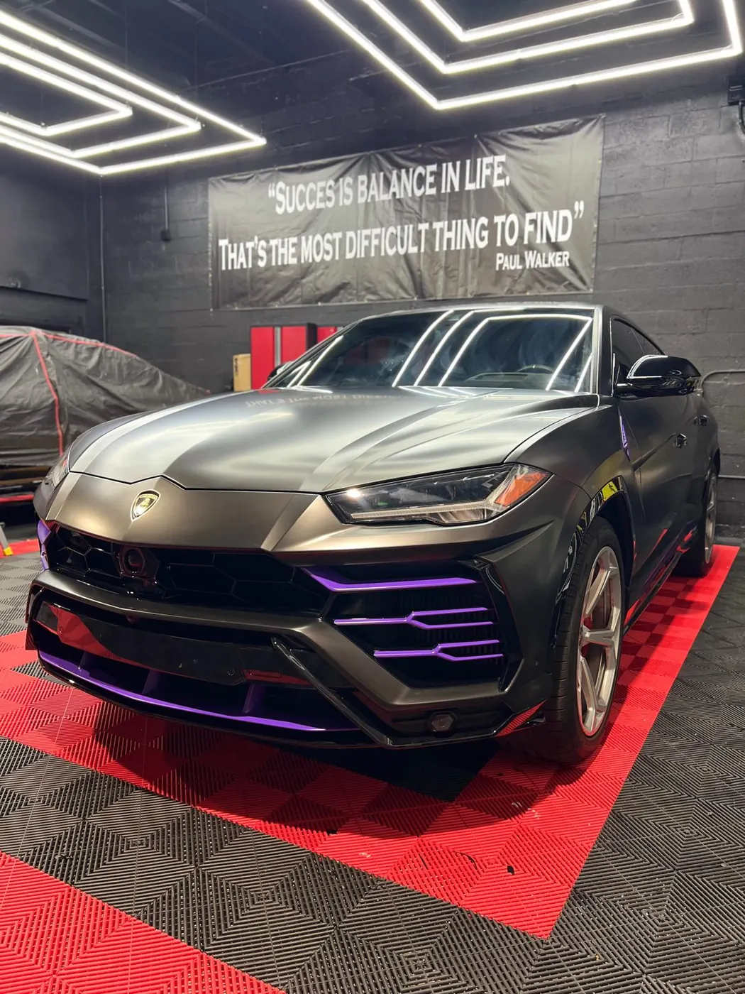 Lamborghini Urus satin black with violet accent customization