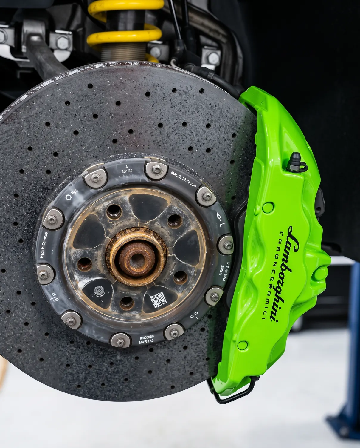 Lime green painted Lamborghini brake caliper