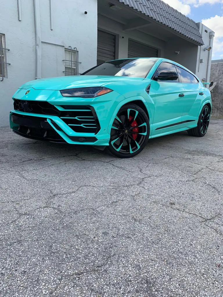 Lamborghini Urus teal with body kit
