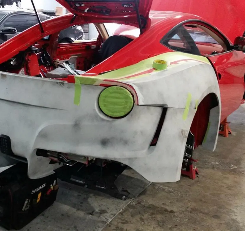 Ferrari F12 widebody fender fabrication in raw fiberglass