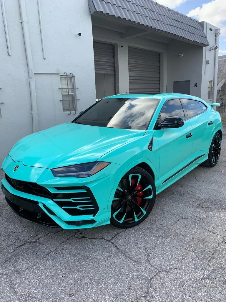 Tiffany teal vinyl wrap Lamborghini Urus