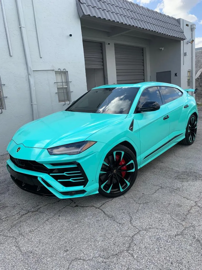 Teal gloss wrap Lamborghini Urus